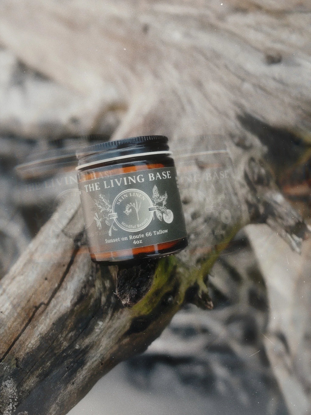 Jar of 'The Living Base' on a natural wooden background